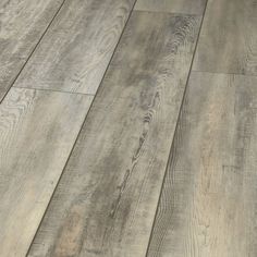 an image of wood flooring that looks like it has been painted in grey and white