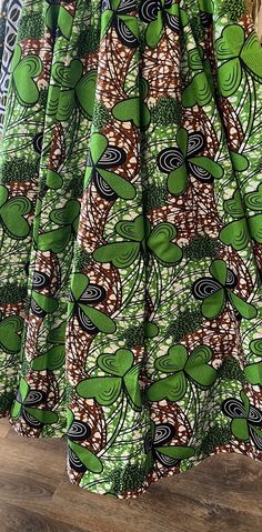 This  is a beautiful ethnic skirt that has an elastic waist band that allows it to fit multiple sizes. A waist tie belt and pockets on the sides for comfort and play. The Length 28 inches long. Why not add this to your collection of wearable art today, Please don't delay. Casual Green Printed Skirt, Green Skirt With Elastic Stretch Waistband, Fitted Green Printed Skirt, Green Fitted Printed Skirt, Fitted Green Hippie Skirt, Hippie Green Skirt For Festival, Green Hippie Maxi Skirt For Festival, Bohemian Green Printed Skirt, Bohemian Multicolor Stretch Skirt