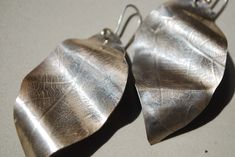 Unique silver leaf earrings are oversized statement earrings for woman, Nature inspired imprint leaf texture earrings. Unusual earrings are artsy jewelry gift for girlfriend or yourself). Handmade silversmith Sterling silver Mother of pearl Cornelian More earrings see here https://www.etsy.com/shop/FaunaSilverGems?ref=seller-platform-mcnav&section_id=39244059 Silver Leaf-shaped Handmade Earrings, Silver Leaf-shaped Metal Earrings, Unique Nickel-free Leaf-shaped Earrings, Artsy Silver Metal Earrings, Handmade Leaf-shaped Metal Earrings, Handmade Metal Leaf-shaped Earrings, Handmade Silver Nature-inspired Earrings, Handmade Nature-inspired Silver Earrings, Elegant Metallic Earrings For Gift