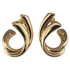 Vintage 14 Karat Yellow Gold Ribbon Hoop Earrings- These elegant earrings are crafted in meticulously detailed 14K yellow gold. Push back closures. Size: 29 mm x 10 mm Stamped: 14K Weight: 2.1 dwt./ 3.2 gr. Very good condition, professionally polished. Will come packaged in a gift box or pouch (when possible) and will be shipped U.S. Priority Mail Insured. DV03182417KCS Combination Fashion, Mineral Jewelry, Ribbon Jewelry, Luxury Earrings, Gold Ribbons, Elegant Earrings, Jewelry Earrings Hoops, Gold Earrings, Gold Jewelry