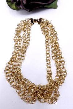 "Vintage gold tone 4 strand necklace, In good vintage condition, It's from 16\" long to 19\" long 8 mm wide. Weighs 3.5 Oz. Thanks." Gold-tone Multi-strand Necklaces For Formal Occasions, Gold-tone Multi-strand Necklace For Formal Occasions, Formal Multi-strand Metal Necklaces, Gold Multi-strand Jewelry For Formal Occasions, Formal Multi-strand Metal Necklace, Costume Jewelry Multi-strand Layered Necklace, Gold Multi-strand Costume Jewelry Necklace, Formal Multi-strand Gold-tone Jewelry, Gold Multi-strand Chain Necklace