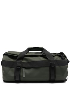 the north face base camp duffel bag in green and black, with straps on each side