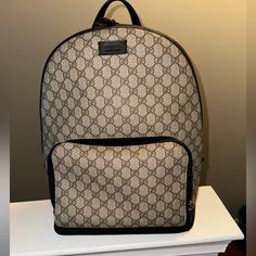 Gucci Print Bookbag Good Condition - Has Some Stains On Inside (See Pictures) N A Lil On The Bottom Pockets Inside Suede Interior Brown N Tan Willing To Negotiate On Price Gucci Brown Standard Backpack, Brown Gucci Standard Backpack, Gucci Brown Backpack For Daily Use, Gucci Standard Everyday Backpack, Gucci Brown Travel Backpack, Gucci Luxury Everyday Backpack, Gucci Luxury Backpack For Everyday, Designer Coated Canvas Backpack For Everyday, Luxury Everyday Gucci Backpack