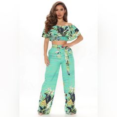 Floral Pant Set Off Shoulder Top Short Sleeve Tiered Detail Smocking Cropped High Rise Pant Tie Waist Detail Wide Leg Pant: Partially Lined 100% Polyester Imported Fashion Nova Jumpsuit, Spaghetti Strap Rompers, 80 Fashion, Olive Pants, Metallic Leggings, Wide Leg Dress Pants, Strapless Romper, Fashion Nova Pants, How To Hem Pants