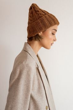 The Classic Cable Hat - our most loved wool beanie. Hand knitted in a warm and soft wool blend. The folded ribbed brim offers extra warmth to your ears and is adjustable so you can wear your beanie as slouchy or as fitted you prefer. Handcrafted in Greece. DETAILS * Adjustable folded brim * Soft wool blend (OEKO-TEX certified - STANDARD 100) * Hand wash in cold water SIZE & FIT * One size, fits most * Custom sizing available upon request COLORS * Here shown in Copper Caramel and Light Grey * Hats For Winter, Wool Hat Men, Lightweight Open Front Cardigan, Cable Knit Beanie, Cable Hat, Cable Knit Hat, Winter Knit Hats, Hand Knit Hat, Cable Stitch