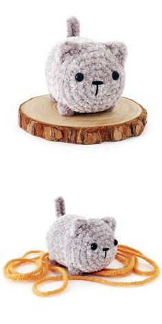 two crocheted stuffed animals sitting on top of a piece of wood next to each other