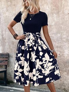 Type:A Line \nDetails:Belted \nStyle:Casual \nHem Shaped:Flared \nWaist Line:High Waist \nNeckline:Round Neck \nSleeve Type:Regular Sleeve \nColor:Navy Blue \nPattern Type:Colorblock \nPattern Type:Floral \nPattern Type:Plants \nPattern Type:All Over Print \nSleeve Length:Short Sleeve \nFit Type:Regular Fit \nLength:Midi \nMaterial:Woven Fabric \nComposition:95% Polyester \nComposition:5% Elastane \nCare Instructions:Machine wash, do not dry clean,wash with the soft detergent \nSheer:No \nFabric:Medium Stretch \nPockets:No \n Dress Asymmetrical, Vacation Dress, Women Midi, Vacation Dresses, Asymmetrical Dress, Womens Midi Dresses, Midi Dresses, Block Print, Woven Fabric