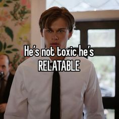 a man wearing a tie with the words he's not tonic he's relatable