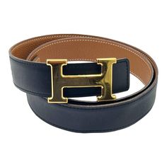 Hermes Constance 32mm Gold H Black Brown Reversible Belt 95cm *Marked Hermes *Made in France *M in sq (2009) *Comes with the original box, dustbag for buckle and ribbon *As seen on too many celebrities -Marked 95 cm/ approximately total length is 43.5″. -Approximately 36.25″ to the first hole , 38.26″ to the last hole. -Unisex -In a very good condition, except hairline scratches on the buckle. 4019-10204  Please see the measurements noted above in the description for best approximate dimensions Designer Black Belt With Logo Strap, Luxury Black Belt With Logo Strap, Classic Brown Belt With Logo Plaque, Luxury Black Belts With Logo Strap, Black Leather Belt With Logo Strap, Formal Black Belt Buckles With Gold-tone Logo, Brown Leather Belt Buckle With Logo Plaque, Brown Leather Belt Buckles With Logo Plaque, Luxury Leather Belt With Logo Strap