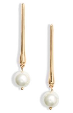 Liquid bar drops suspend lustrous faux pearls on elegantly tapered earrings finished in high-shine goldtone plate. 2 1/2" drop Surgical steel post back Goldtone plate/glass faux pearl Imported Nordstrom Elegant Gold Jewelry, Elegant Nordstrom Gold Jewelry, Modern Bridal Earrings, Gold And Pearl Earrings, Justin Alexander, Gold Pearl Earrings, Steel Post, Modern Bridal, Gold Drop Earrings