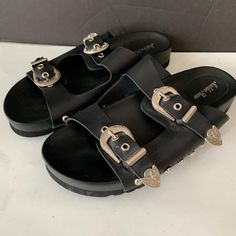 Malika Summer Women Fashion Metal Stud Decorative Slippers Sandals Black Color, Silver Tone Hardware Size 38 Us Size 7 Never Worn Condition Black Closed Toe Sandals With Metal Pin Buckle, Trendy Sandals With Metal Feet And Round Toe, Black Sandals With Metal Pin Buckle For Spring, Trendy Open Toe Sandals With Metal Pin Buckle, Trendy Sandals With Metal Pin Buckle, Trendy Sandals With Metal Pin Buckle And Round Toe, Black Sandals With Metal Pin Buckle, Spring Black Sandals With Metal Pin Buckle, Summer Mules With Metal Feet And Round Toe