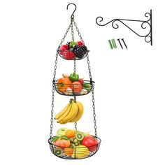 PRICES MAY VARY. Heavy Duty Wire Kitchen Basket: Vertical installation, better control of the height of the metal fruits basket. Round metal piece added to the bottom of the hanging basket to effectively prevent small fruits from falling. Elegant and minimalist design that is both functional and decorative. Three tiered hanging fruit basket can change the overall look of kitchen, especially small ones where storage and counter space is limited. Removable Banana Hook: With a banana hook, it is a Hanging Produce Basket, Hanging Vegetable Basket, Hanging Fruit Basket, Black Wire Basket, Produce Baskets, Produce Storage, Hanging Fruit Baskets, Ceiling Hooks, Fruit Baskets