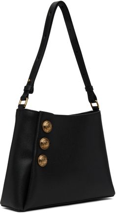 Grained calfskin shoulder bag in black. · Adjustable crossbody strap · Logo hardware at face · Magnetic press-stud closure · Zip pocket at interior · Unlined · Logo-engraved gold-tone hardware · H7.5 x W10 x D2.75 Supplier color: Noir Formal Calf Leather Shoulder Bag With Gold-tone Logo Plaque, Gold Calf Leather Shoulder Bag For Everyday, Gold Calf Leather Shoulder Bag, Formal Leather Shoulder Bag With Gold-tone Logo, Gold Calf Leather Shoulder Bag With Brass Hardware, Gold Calf Leather Shoulder Bag For Business, Black Shoulder Bag With Gold-tone Logo For Office, Designer Shoulder Bag With Brass Hardware For Office, Business Shoulder Bag In Gold With Palladium Hardware