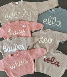 My current turnaround time for these hand embroidered sweaters is approximately 2 weeks.  These super cute hand embroidered name sweaters are perfect for your little ones! Sizes 0-6m to 4T. Sweaters are OVERSIZED and have a chunky fit. Refer to measurements below. Second photo of the name Sophie is with chunky dusty pink yarn for the letters. The flower is chunky natural with mustard center. If you would like a flower, order includes one flower free or charge for names without "i's." please include that you would like one. It will be located on the top left of sweater. 100% COTTON  For these sweaters below, 18-24m is the same as 2T. White Mocha Pink Dusty Blue Rose Pink Cream/Beige Lilac Measurements 0-3 months: length-11in./bust-12in./ sleeve-6in. 3-6 months: length-11.5in./bust-13in./sle Cute Embroidered Winter Tops, Cute Winter Tops With Embroidered Text, Cute White Sweater With Embroidered Text, Cute White Embroidered Sweater, White Cute Sweater With Embroidered Text, Cute Winter Sweater With Letter Embroidery, Personalized Cute Crew Neck Sweater, Personalized Pink Sweater For Winter, Cute Pink Sweater With Custom Embroidery