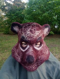 For those who love transformations and fun, I offer a bear mask! In the mask, you will be the center of attention and will receive a sea of compliments - I am sure of it. Awaken your wild nature in my felted wool mask.Unleash your wild side with this luxury felt bear mask for adults. Crafted with meticulous attention to detail, this unisex mask captures the essence of a fierce predator. The intricate felt design brings the bear's rugged features to life, from its piercing eyes to its snout. Slip Mask Theater, Festival Headdress, Theater Mask, Felt Bear, Felt Design, Piercing Eyes, Bear Mask, Animal Mask, Carnival Mask