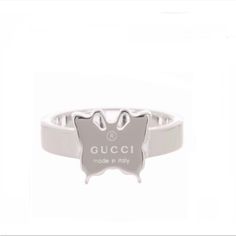 The Gucci Logo Butterfly Ring In Sterling Silver Is Crafted From A High Polish Sterling Silver In Italy. The Ring Is Crafted Of Sterling Silver And Features A Butterfly Motif Engraved With The Gucci Logo. This Is A Chic Ring With The Modern Style Of Gucci! Gucci Logo Butterfly Ring In Sterling Silver 100% Sterling Silver Butterfly Construction Engraved Logo Size 6 Us Gucci (It) Size 12 Made In Italy Designer Everyday Luxury Ring, Luxury White Butterfly Ring For Formal Occasions, Luxury White Butterfly Ring For Formal Events, Gucci White Gold Ring In Fine Jewelry Style, Gucci Fine Jewelry White Gold Rings, Gucci White Gold Fine Jewelry Ring, Designer White Gold Rings For Everyday Luxury, Luxury Butterfly Ring For Anniversary, Designer Gucci Rings With Polished Finish