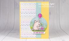 a card with a pig holding a balloon