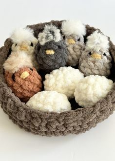 small crocheted stuffed animals in a basket