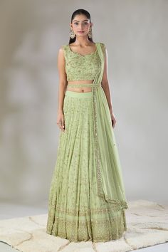 Mint green lehenga with cutdana, sequins embroidered floral jaal pattern embroidery. Comes with coordinating embroidered blouse, border work dupatta and belt. - Aza Fashions Embroidered Pista Green Pre-draped Saree For Reception, Green Embroidered Pre-draped Saree For Reception, Green Pre-draped Saree With Intricate Embroidery For Wedding, Green Lehenga With Cutdana For Reception, Green Pre-draped Saree With Intricate Embroidery For Reception, Green Choli For Reception With Traditional Drape, Green Lehenga For Reception, Green Choli With Cutdana For Reception, Green Resham Embroidered Fabric For Reception