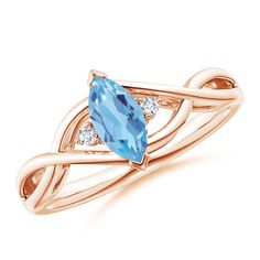 Mounted atop a gracefully twisted shank is a marquise Blue Topaz held in a V prong setting. It is flanked by two round diamonds that sparkle like celestial stars. The Blue Topaz dazzles in its tropical blue hue while the diamonds accentuate the gemstone. Designed in 14k rose gold, this Blue Topaz and diamond ring exhibits elegance and opulence. Aquamarine Solitaire Ring, Celestial Stars, Swiss Blue Topaz Ring, Amethyst And Diamond Ring, Blue Gems, Aquamarine Rings, Swiss Blue Topaz, Blue Topaz Ring, March Birth Stone