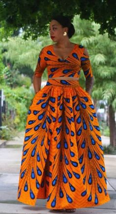 This outfit is a female African dress. It is a hand crafted Afro-chic dashiki. It comes in various sizes which you select from the size chart when placing your order. I accept custom measurements to process your orders for you if you want. So it is a custom made piece for you to show off in. If you Spring Ankara Maxi Dress, Spring Maxi Dress In Ankara Fabric, Fitted Ankara Maxi Dress For Spring, Bohemian Fitted Ankara Dress, Bohemian Ankara Maxi Dress, Dashiki Prom Dress, African Print Long Dress, Dashiki Outfit, African Skirt