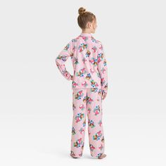 Your kid will stay cozy as they wind down for bed with this Squishmallows 2-Piece Coat Pajama Set in pink. This pack includes a long-sleeve sleep shirt in a front button-down style with allover Squishmallow prints along with the "Warm and Cozy" text plus pajama pants with an elastic waistband and the same Squishmallow prints. Made from jersey fabric, this classic-fit pajama set is a must-have addition to your kid's PJ wardrobe. Playful Pink Sleepwear For Sleepover, Multicolor Winter Sleepwear For Sleepover, Pink Sets For Winter Sleepover, Pink Winter Sleepover Sets, Pink Sets For Sleepover In Winter, Pink Sleepover Set For Winter, Pink Winter Bedtime Sets, Cozy Pajamas, Pajama Pant