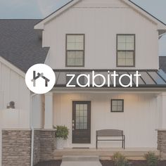 a white house with the word zabitta on it