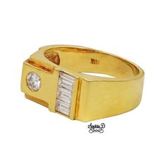 an 18k gold ring with baguets and diamonds, by cartier's