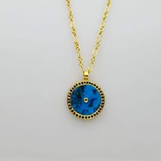 SIGNATURE TURQUOISE GOLD NECKLACE Luxury Yellow Gold Turquoise Necklace, Luxury Turquoise Pendant Necklace, Blue Round Pendant Jewelry, Tarnish Resistant, Luxury Turquoise Round Necklace, Elegant Blue Necklace With Coin Pendant, Luxury Round Turquoise Necklace, Blue Tarnish-resistant Round Pendant Jewelry, Blue Medallion Jewelry With Adjustable Chain, Gold Plated Natural Stones Necklace