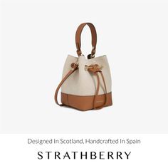 A modern take on the classic bucket bag, our best-selling osette is your perfect everyday companion. Deceptively spacious, the soft structure is handcrafted in spain from buttery-soft pebble finished leather and features an elegant drawstring closure, complete with our signature music bar. This compact yet versatile silhouette can be carried in hand by the leather top-handle, or styled as a crossbody bag with the detachable leather strap. Experience the relaxed charm of canvas, as our best-selling lana osette is re-imagined for the season. Pairing our signature grain leather with a two-tone canvas produced in italy, this relaxed style perfectly encapsulates the magic of ibiza and a summer of endless possibilities. Elegant Bucket Bag With Leather Handles In Natural Color, Luxury Beige Satchel Bucket Bag, Elegant Natural Bucket Bag With Leather Handles, Elegant Natural Double Handle Bucket Bag, Elegant Natural Color Bucket Bag Tote, Elegant Natural Color Bucket Tote Bag, Elegant Natural Color Tote Bucket Bag, Elegant Natural Bucket Shoulder Bag, Elegant Natural Color Bucket Shoulder Bag