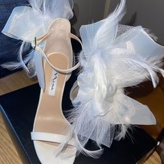 Single Soles Heels With Attached Statement Bow And Feathers. Never Worn! New With Tags. Runs Small! White Heels With Removable Insole And Open Heel, White High Heel Wedding Shoes With Removable Insole, White Open Heel Shoes With Removable Insole, Swan Heels, Single Sole Heels, Everything I Own, Nina Shoes, Party Outfits, Crazy Shoes