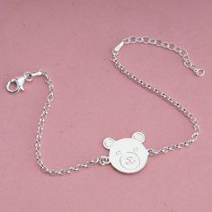 Teddy Bear Bracelet  MATERIALS * Material: High-Quality 925 Sterling Silver  * Gold Plating options: 24K Gold Plating * Handmade item SIZES * Pendant size: Height: 16mm Width: 19mm * Pendant Thickness: 0.7mm * Chain length : 15cm + 5 extension GIFTING All items come ready to give in a beautiful gift box with a certificate of authenticity. packaging with bubble wrapped to ensure no damage can be made during Shipping. SHIPPING All items are custom-made to order. USA - Parcels are shipped with USPS Silver Novelty Charm Bracelet For Birthday, Playful Nickel-free Silver Bracelets, Novelty Silver Hypoallergenic Bracelets, Cute Silver Hypoallergenic Bracelets, Playful Silver Nickel-free Bracelets, Cute Hypoallergenic Silver Bracelets, Cute Silver Bracelet For Birthday, Cute Silver Bracelets For Birthday, Playful Adjustable Silver Bracelets