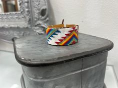 Southwestern White Cuff Bracelet As Gift, Southwestern Style White Cuff Bracelet As Gift, Artisan White Cuff Bracelet As Gift, Artisan White Cuff Bracelet Gift, Southwestern White Beaded Bracelets With Colorful Beads, Adjustable Multicolor Jubilee Cuff Bracelet, Adjustable White Artisan Cuff Bracelet, Artisan White Bangle Bracelets, Artisan White Bangle Bracelet