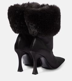 Find MAGDA BUTRYM Faux Fur-trimmed Satin Ankle Boots on Editorialist. Upper: fabric. Lining: leather. Sole: leather insole and sole. Toe shape: square toe. Made in Italy. Includes: presentation box, dust bags. Designer color name: Black. Closure: zipped side. Winter Heeled Boots With Leather Sole, Winter Heeled Boots With Padded Heel, Designer Winter Boots With Leather Sole, Winter Party Boots With Leather Sole, Winter Party Heeled Boots With Leather Sole, Formal Heeled Boots With Rubber Heel Cap For Winter, Chic Winter Boots With Faux Fur Trim, Winter Evening Boots With Padded Heel, Luxury Fitted Winter Boots