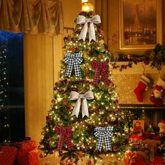 a decorated christmas tree in a living room