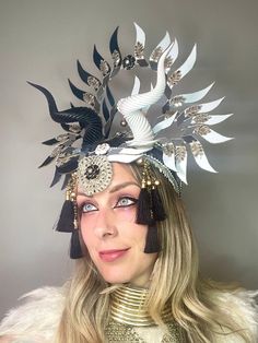 Feel unique with this one-of-a-kind headpiece! Designed with dancers/performers in mind, this is perfect for the stage, a photo shoot or festival. It's very lightweight with a spring lock elastic in the back to keep it snug. As always- please reach out! I'd love to make something custom for you <3 Bohemian Costume Hat With Structured Crown For Festivals, Fantasy Festival Headpiece With Structured Crown, Unique Festival Headpiece With Tall Crown, Carnival Festival Headpiece With Structured Crown, Unique Tall Crown Headpiece For Festival, Adjustable Tall Crown Headpieces For Festivals, Adjustable Headpiece For Carnival Festival, Adjustable Headpieces For Carnival Festival, Unique Headpieces For Carnival Festival