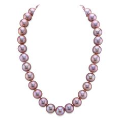 When it comes to the hottest and most demanded color in freshwater pearl necklaces, pink definitely fits that description. If you are looking for an affordable pearl necklace that is absolutely gorgeous, here is a AAA quality 13-14mm lavender/pink freshwater pearl masterpiece. This pearl necklace has 'Very High' grade luster (our highest grade available) and is affixed with a beautiful 14K white gold ball clasp. Optional Clasps are also available. Included with this item is a complementary pearl polishing cloth, giving you the ability to maintain this necklace's elegant beauty for years to come. Pink Single Strand Akoya Pearl Necklace, Pink Akoya Pearl Single Strand Necklace, Pink Akoya Pearl Necklaces With Round Beads, Pink Akoya Pearl Round Bead Necklace, Pink High Luster Pearl Necklace, Pink High Luster Round Pearl Necklace, Formal Pink Akoya Pearl Necklace, Luxury Pink Pearl Necklace, Formal Pink High Luster Necklace