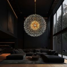 a living room filled with furniture and a large chandelier hanging from the ceiling