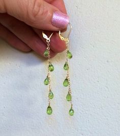 14k gold Natural Green Peridot Cascade Earrings.  Long chains.  Pedidot jewelry.  August birthstone. Leo Birthday, Jewelry Delicate, Peridot Earrings, August Birthstone Jewelry, August Birthstone, Dope Jewelry, Funky Jewelry, Jewelry Lookbook, Green Peridot