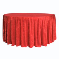 a red table cloth on top of a round table