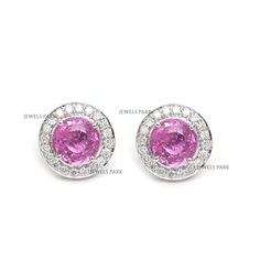 Pink sapphire diamond round cut earring studs gold | Natural pink sapphire halo diamond stud tops earrings gold | Pink sapphire stud gold GEMSTONE DETAILS : ✦ Gemstone : Pink Sapphire ✦ Gemstone Type : Natural ✦ Gemstone Size : 6 mm ✦ Gemstone Shape : Round ✦ Number of Gemstones : 2 ✦ Gemstone Weight : 2.35 Carats ✦ Gemstone Grade : AAA DIAMOND DETAILS : ✦ Diamond Type : Natural ✦ Diamond Size : 2.30 MM ✦ Diamond Color : F-G ✦ Diamond Clarity : Slightly included ✦ Diamond Cut : Excellent  ✦ Diamond Weight : 0.34 Carats METAL DETAILS : ✦ Metal : 14K/18K Gold ✦ Metal Color : Yellow / White / Rose Gold ✦ Setting : Flush Setting ✦ Ring Box : Yes SHIPPING DETAILS : ✦ Production time : 10-12 days ✦ Delivery time : 7-8 days ✦ Expedited shipping : Available ✦ Expedited shipping service : UPS ✦ Exp Gia Certified White Gold Pink Sapphire Jewelry, Pink Sapphire Halo Jewelry With Round Cut, Elegant Pink Sapphire Jewelry With Halo Design, Elegant Pink Sapphire Halo Jewelry, Gia Certified Sapphire Diamond Earrings, Pink Sapphire Jewelry With Halo Design For Gifts, Gia Certified Pink Fine Jewelry Earrings, Dazzling Pink Round Earrings, Sapphire Diamond Earrings With Round Gemstone