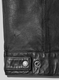 Our Maverick Trucker Leather Jacket is a must-have for those looking to make a sophisticated statement. A classic and timeless wardrobe staple, this versatile piece is crafted with the highest quality leather to ensure a unique and luxurious look.     With its rugged yet easy aura, this stylish jacket will bring cool confidence to any look for the season ahead.   Made Using Pure Napa Sheep Skin Soft Leather.   Look Includes     Black Washed and Waxed  Leather   Antique Silver Hardware     You can change the trims during customization if required.    Made as per your measurements. Classic Leather-lined Biker Jacket For Business, Luxury Leather Biker Jacket With Pockets, Classic Leather Jacket With Flap Pockets, Classic Biker Jacket With Flap Pockets, Classic Biker Jacket With Button Closure, Leather Biker Outerwear With Flap Pockets, Classic Leather Jacket With Leather Lining, Rugged Leather Biker Jacket For Workwear, Classic Leather Biker Jacket With Button Closure