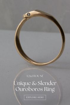 Love minimalistic ancient jewelry that also has meaning? The 12th House Ouroboros ring can be worn as a slender ring to add to your stack; the snake hugs your finger with the glint of two black diamonds as a minimalist symbol of rebirth. Click here to get your Ouroboros band and to shop more unique wedding bands. Antique Yellow Gold Jewelry With Single Diamond, Oval Single Diamond Promise Jewelry, Antique Hand Forged Ring, 14k Stamped Hoop Jewelry For Wedding, Antique Hallmarked Snake Ring, Antique 14k Gold Hand Forged Rings, Antique 14k Gold Promise Jewelry, Hand Forged Vintage Promise Jewelry, Hand Forged Brass Wedding Jewelry