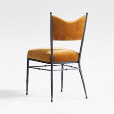 an orange chair with metal frame and backrests, against a white background the chair has a yellow upholstered seat