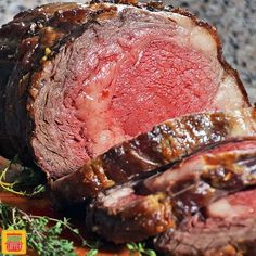 a piece of meat sitting on top of a wooden cutting board