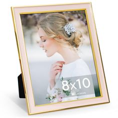 a pink and gold photo frame with the number eight on it's left side