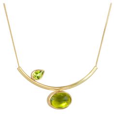 This very contemporary peridot and 18K gold 16.5" necklace is designed and made by London jeweler, Lucy Martin. The design playfully balances a peridot cabochon with a faceted peridot. Lucy creates art jewelry with a unique sense of color, composition and asymmetry. Inspired by travel and architecture each piece is handcrafted in recycled metals using traditional hand fabrication techniques to produce sleek, wearable art jewelry with character. The work of jewelry maker Lucy Martin has been sele Wearable Art Jewelry, Peridot Jewelry, Contemporary Pendant, Cabochon Pendant, Jewelry Inspo, Contemporary Jewelry, Jewelry Maker, Art Jewelry, Metal Jewelry