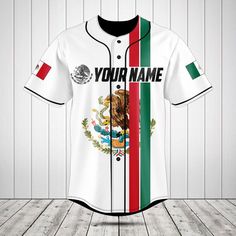 a baseball jersey with the flag of mexico on it is displayed in front of a wooden wall