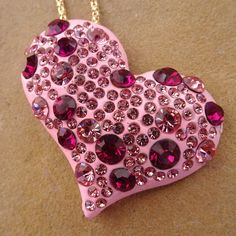 Perfect For Date Night Or Valentine's Day, This Lovely Bejeweled Heart Pendant Doubles As A Brooch! This Statement Piece Looks Pretty When Worn As A Necklace Or Pinned Onto Your Favorite Backpack, Bag, Or Denim Jacket. This Big Pink Heart Charm Measures About 2.5 Inches Across And 2 Inches In Height. It Hangs From A 28 Inch Gold Colored Chain And Is Finished With A Lobster Style Clasp. Brand New! Pink Bling Necklace For Gift, Pink Rhinestone Necklace For Valentine's Day, Pink Heart-shaped Necklace With Rhinestones, Pink Heart-shaped Rhinestone Jewelry, Pink Heart-shaped Rhinestone Necklace, Pink Heart Pendant Jewelry With Rhinestones, Pink Crystal Jewelry Brooch, Pink Crystal Brooch Jewelry, Sparkly Things