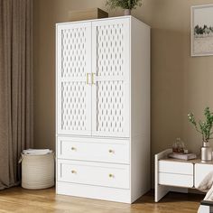 a white armoire sitting on top of a wooden floor